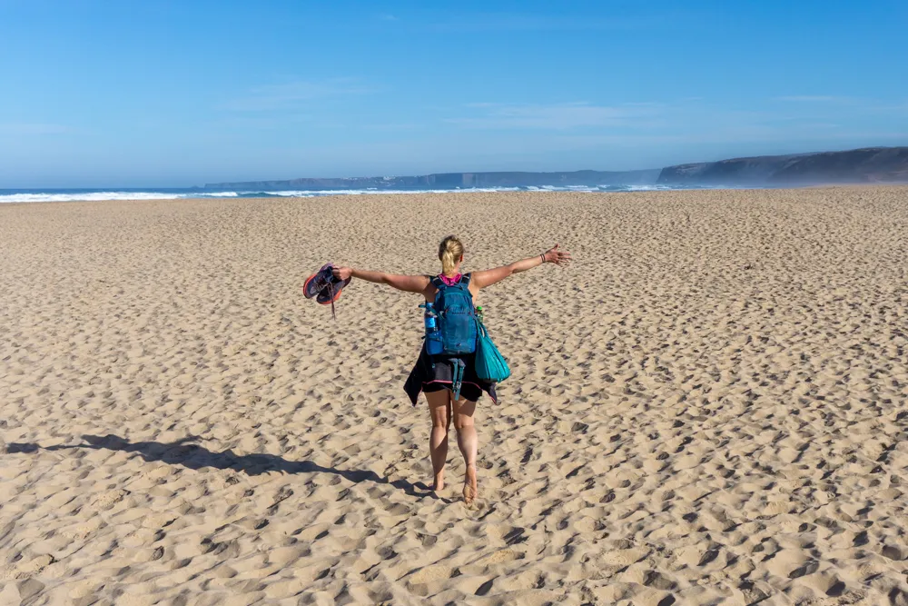 Hiking in Lagos: 7 great hiking trails | Portugal Co on the beach near Carrapateira